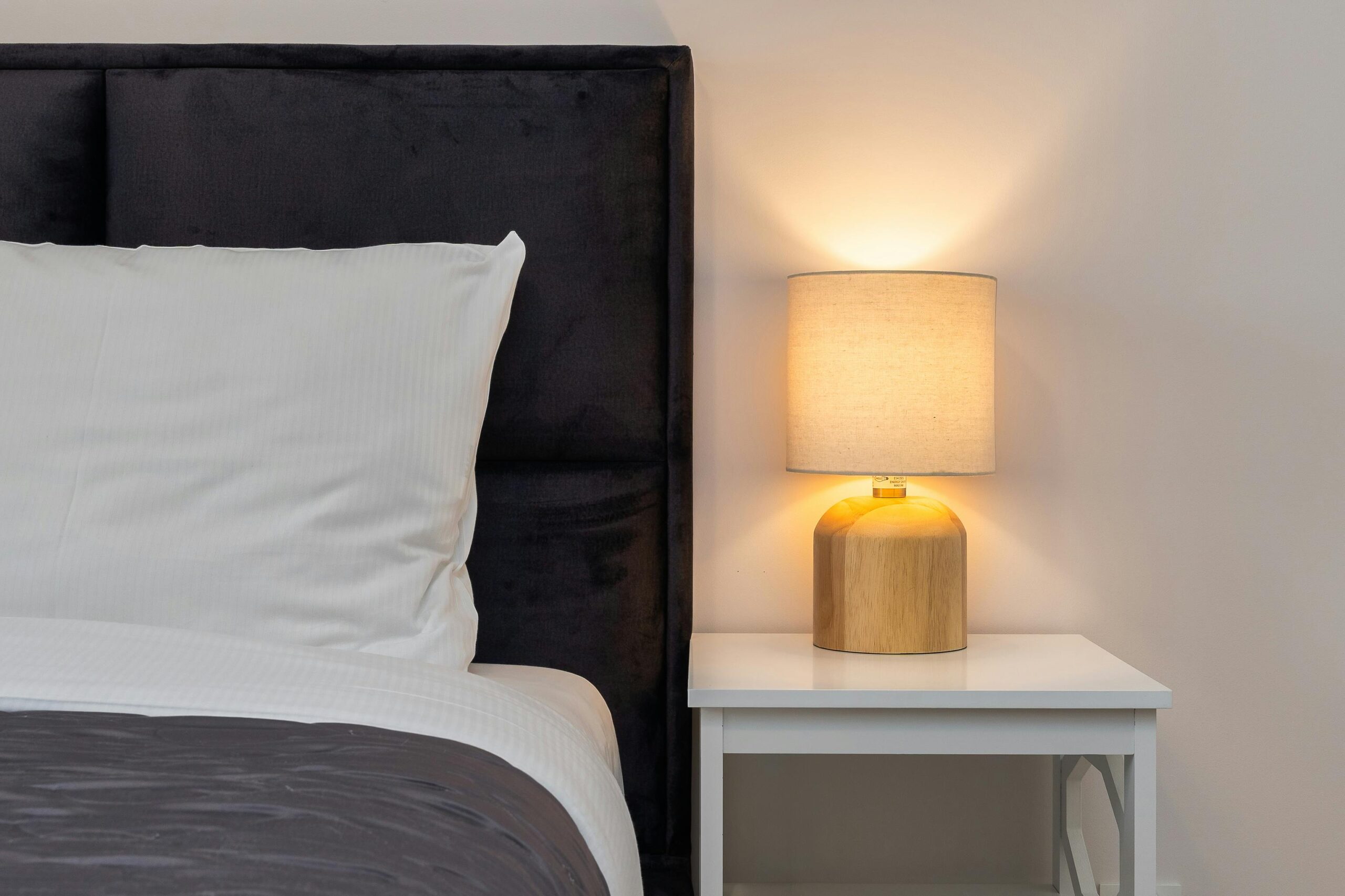 wooden bedside lamp for warm and cozy bedroom lighting